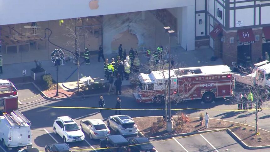 car-drives-through-an-massachusetts-apple-store-kyma