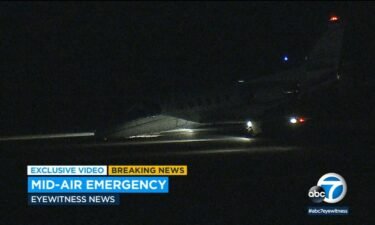 A small jet landed at Van Nuys Airport with stuck landing gear