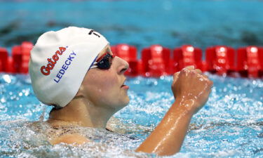 Katie Ledecky of the United States reacts after setting a world record in the Women's 800m Freestyle final on Day 3 of the FINA Swimming World Cup 2022 Leg 3 at Indiana University Natatorium on November 5