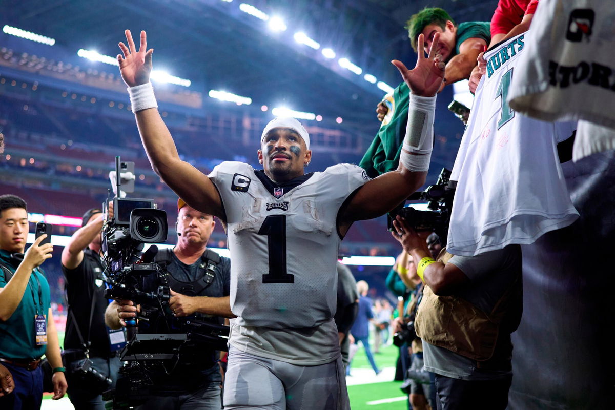 <i>Cooper Neill/Getty Images</i><br/>Jalen Hurts celebrates as he runs off the field after defeating the Houston Texans at NRG Stadium on November 3.