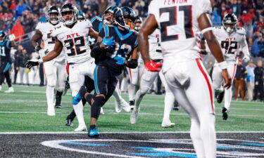 D'Onta Foreman (center) scores a touchdown during the third quarter against the Falcons on November 10.