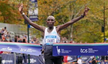 Chebet crosses the finish line of the NYC Marathon.