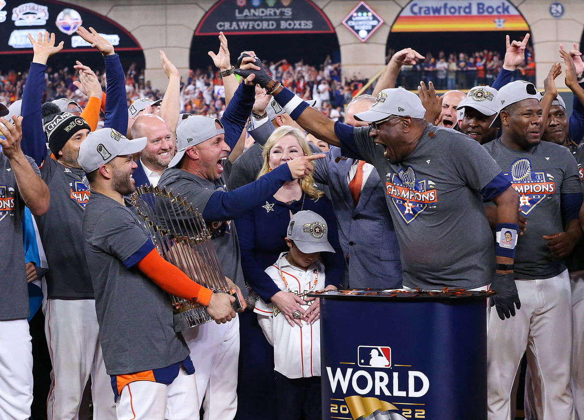 <i>Troy Taormina/USA TODAY Sports/Reuters</i><br/>Dusty Baker (center right) celebrates with his team in Houston on November 5.