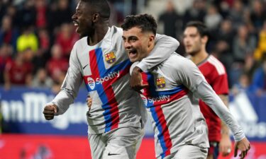 Pedri celebrates Barça's first goal against Osasuna with Ousmane Dembélé.