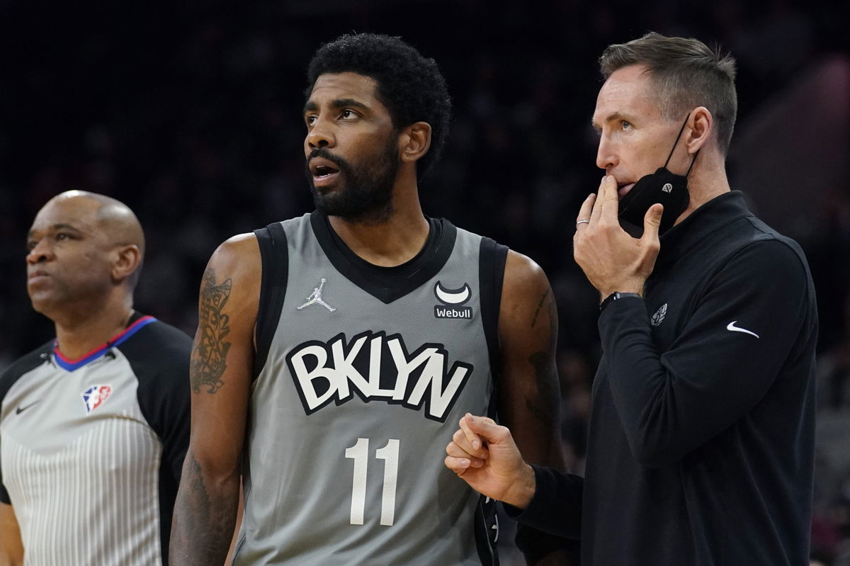 <i>Eric Gay/AP</i><br/>Irving talks with now-former head coach Steve Nash during a game against the San Antonio Spurs on Friday