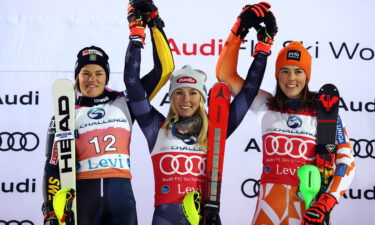 Mikaela Shiffrin celebrates on the podium.