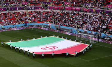 A giant flag of IR Iran on the pitch prior to the FIFA World Cup Qatar 2022 Group B match between Wales and Iran at Ahmad Bin Ali Stadium on November 25