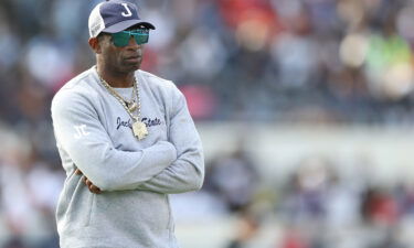 Head coach Deion Sanders of the Jackson State Tigers looks on before the game against the Southern University Jaguars in the SWAC Championship Saturday in Jackson