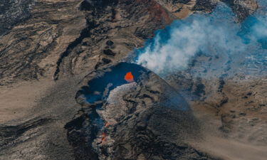 An aerial view of the Mauna Loa volcano erupting Friday in Hilo