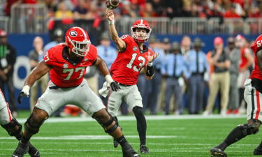 Georgia quarterback Stetson Bennett (13) throws a pass against the LSU Tigers.