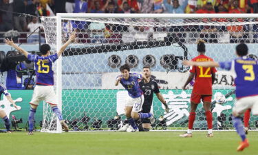 Ao Tanaka celebrates after scoring Japan's second goal against Spain.