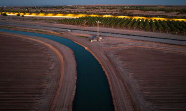 The All-American Canal flows near a section of the US-Mexico border in September. The canal