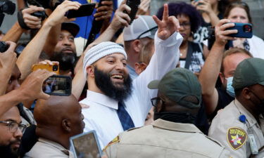 Hae Min Lee's brother is requesting a redo of the hearing that vacated Adnan Syed's murder conviction. Syed waves as he leaves the courthouse in Baltimore