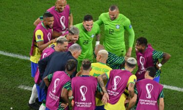 Tite joined in with Brazil's celebrations for the third goal.