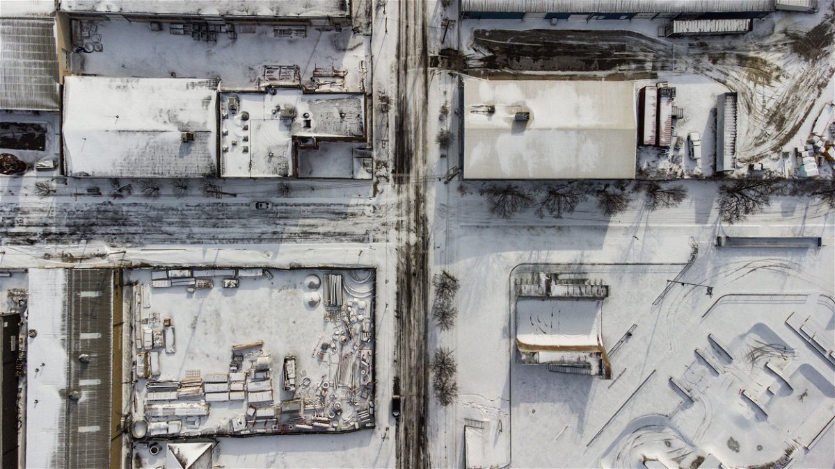 Snow-covered buildings are seen in Louisville