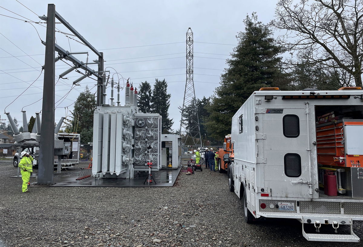 <i>Ken Lambert/The Seattle Times/AP</i><br/>A Tacoma Power crew works at an electrical substation damaged by vandals on December 25 in Graham