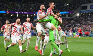 Croatia players celebrate after winning the penalty shoot out against Japan.