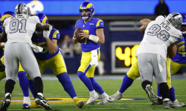 Los Angeles Rams quarterback Baker Mayfield looks to pass against the Las Vegas Raiders during the first quarter of Thursday night's game.