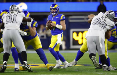 Los Angeles Rams quarterback Baker Mayfield looks to pass against the Las Vegas Raiders during the first quarter of Thursday night's game.
