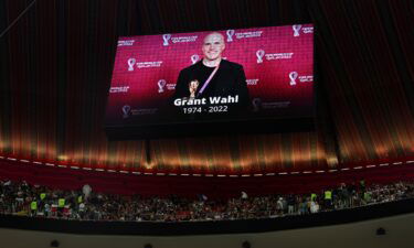 The LED board shows a photo of Grant Wahl prior to the quarterfinal match between England and France.