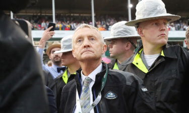 Trainer Jason Servis waits for an inquiry result after the 2019 Kentucky Derby.