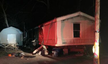 A woman died and her grandson was injured in a late night fire Friday in Mansfield.