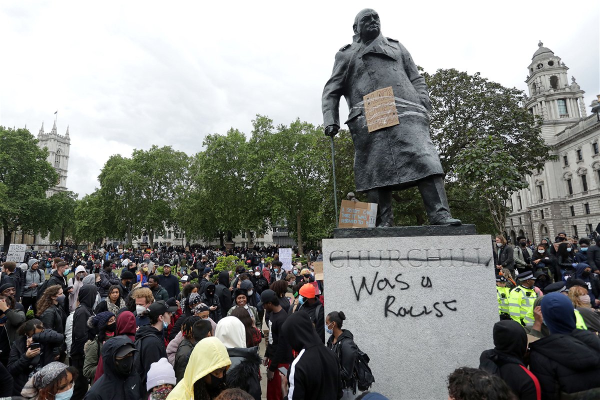A statue of former British Prime Minister Winston Churchill is seen defaced in Parliament Square
