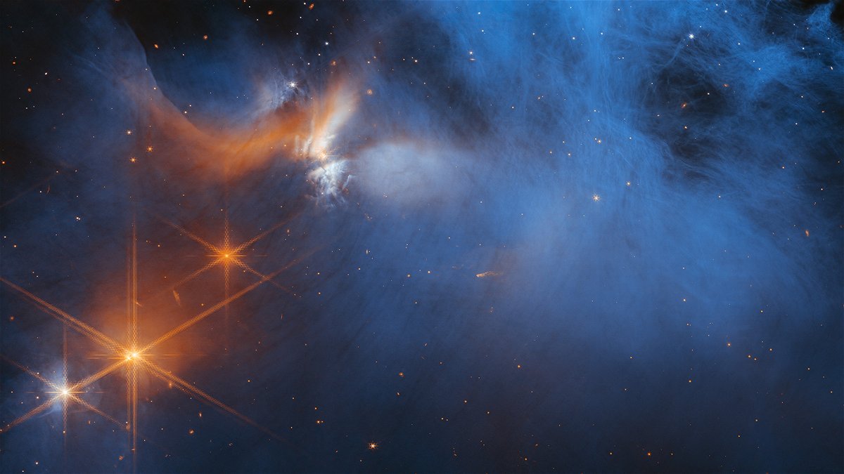Stars shine through the hazy material of the Chameleon I dark molecular cloud