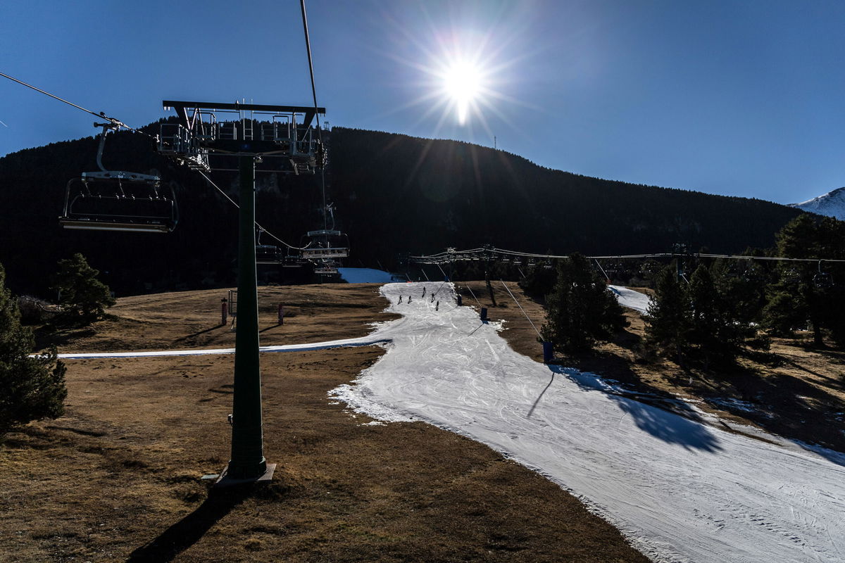 <i>Angel Garcia/Bloomberg/Getty Images</i><br/>Dry ground surrounds a narrowed ski run at La Molina ski resort in Girona