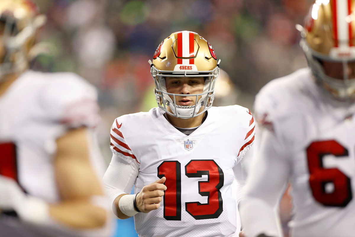 <i>Steph Chambers/Getty Images</i><br/>Brock Purdy of the San Francisco 49ers heads to the locker room for halftime against the Seattle Seahawks on December 15