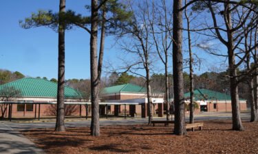 Tall pine trees are pictured outside Richneck Elementary School on January 7 in Newport News