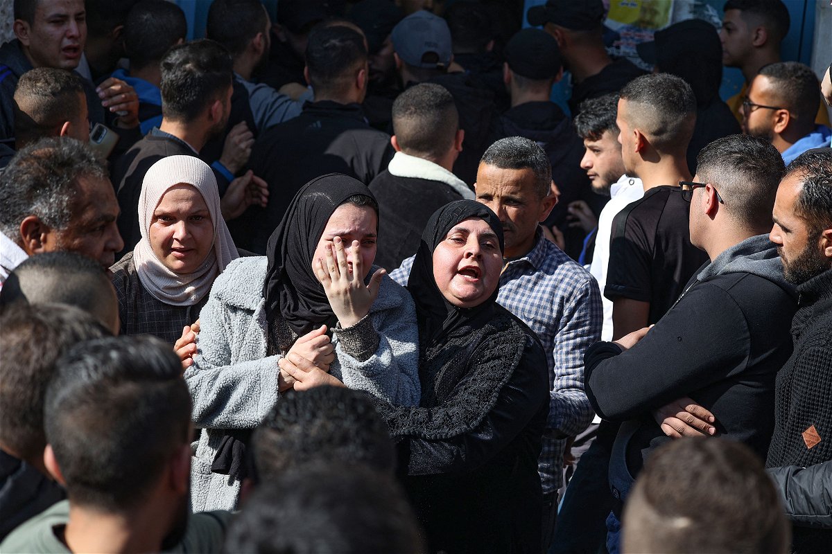 Family members of one of the Palestinian people killed during the Israeli raid on January 26