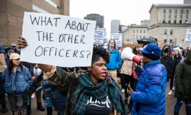 Organizers protest in front of the Memphis Police Department headquarters Saturday