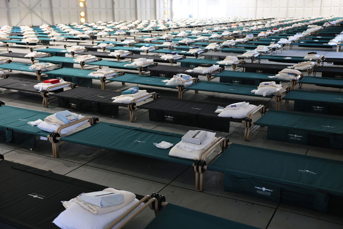 <i>Michael M. Santiago/Getty Images</i><br/>Beds are seen in the dormitory during a tour of the Randall's Island Humanitarian Emergency Response and Relief Center on October 18