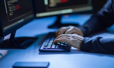 Cybercriminals hacked employees of at least two US federal civilian agencies last year as part of a "widespread" fraud campaign that sought to steal money from individuals' bank accounts