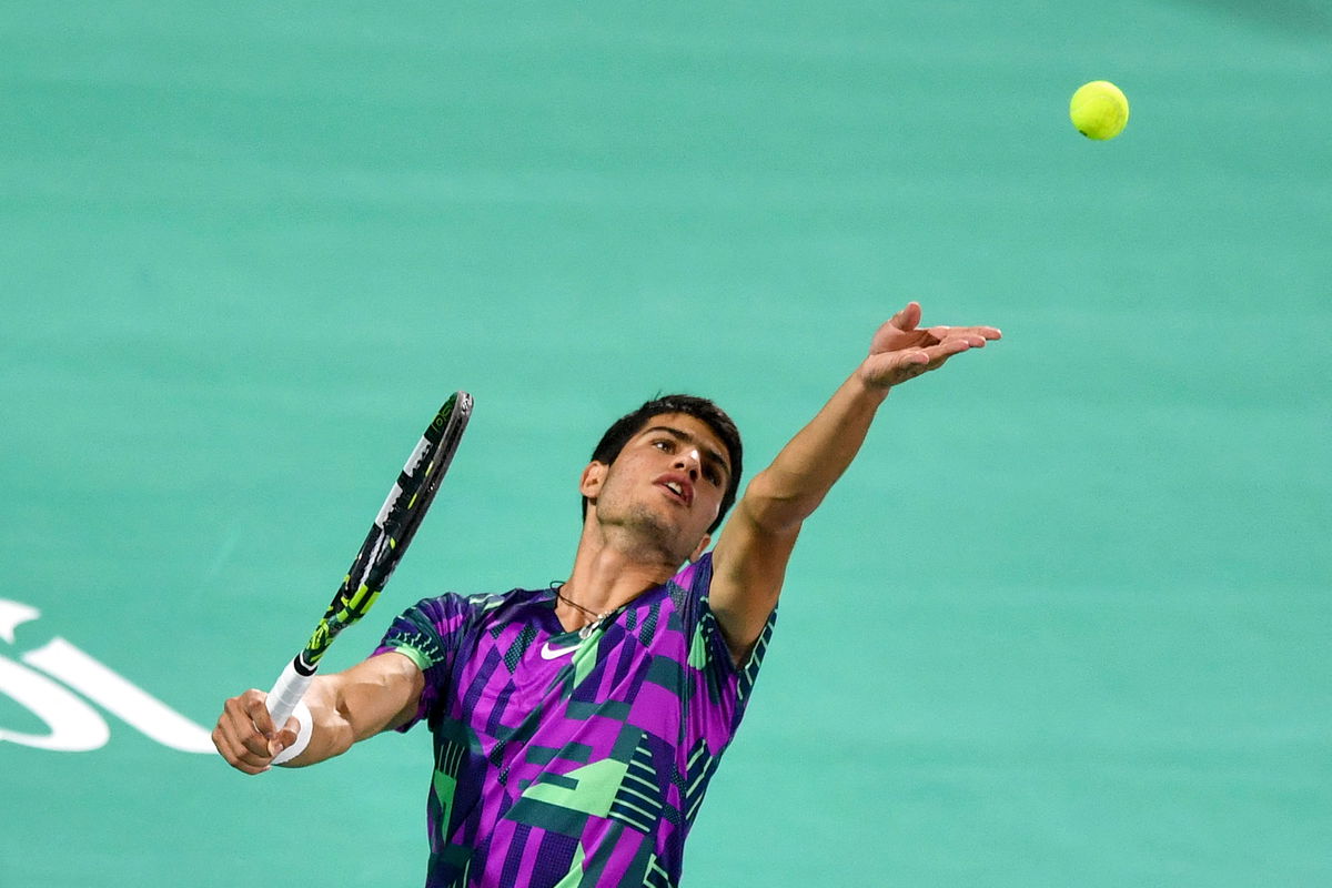 <i>Ryan Lim/AFP/Getty Images</i><br/>Spain's Carlos Alcaraz serves during the semi-final of UAE's Mubadala World Tennis Championship in Abu Dhabi on December 17