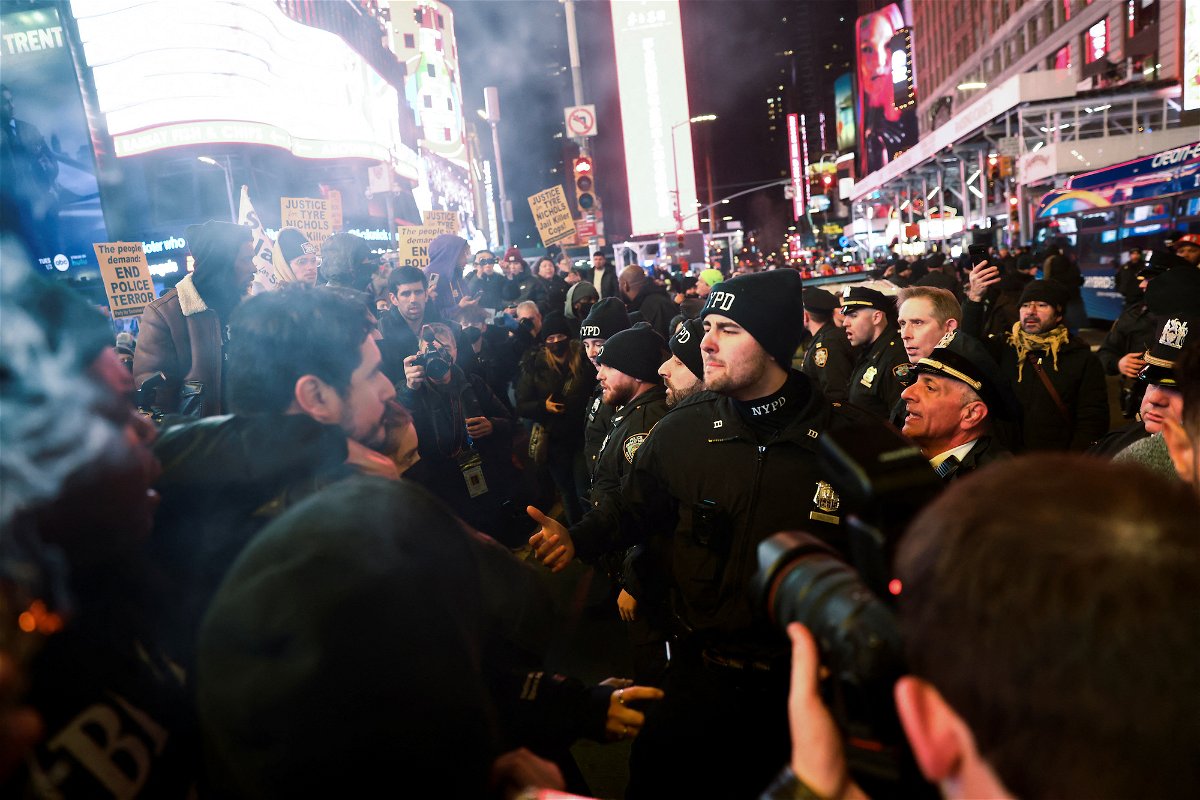 Police officers and protesters clash in New York on January 27.