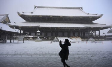 The ground is covered with snow in Kyoto on Jan. 25