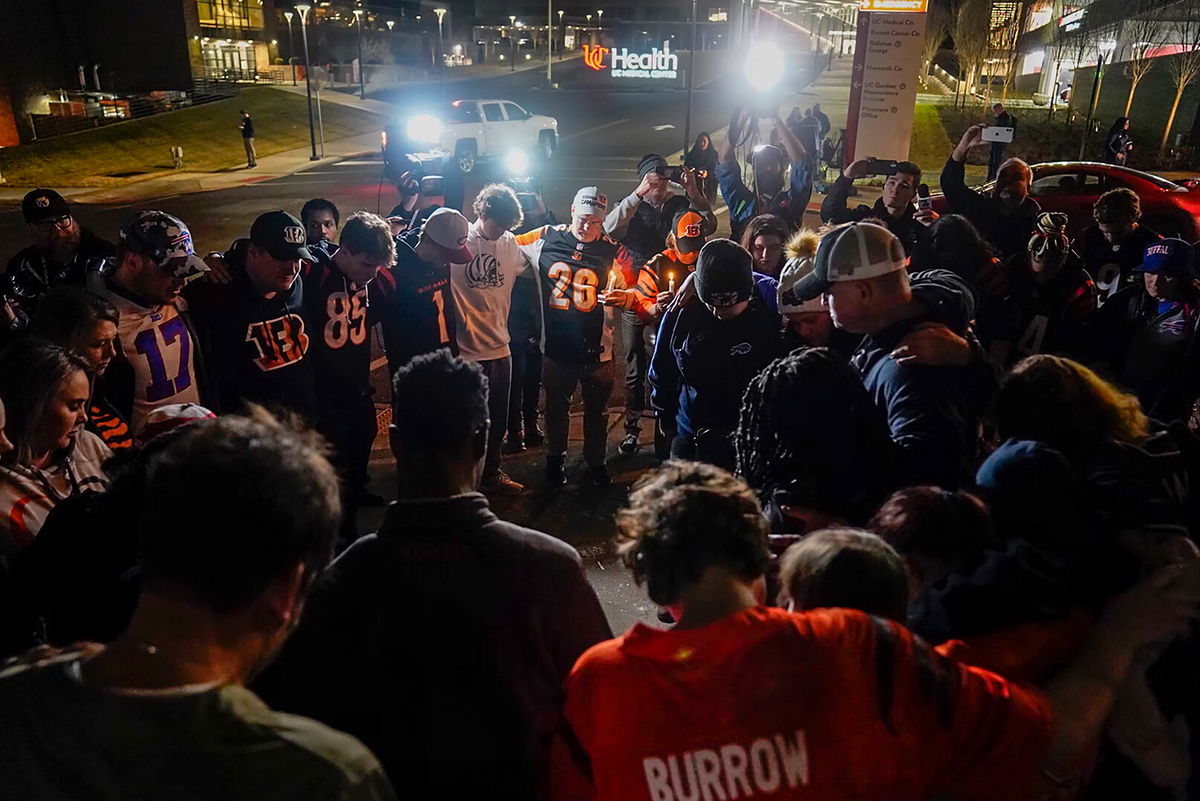 <i>Jeff Dean/AP</i><br/>Fans gather outside the University of Cincinnati Medical Center in Cincinnati