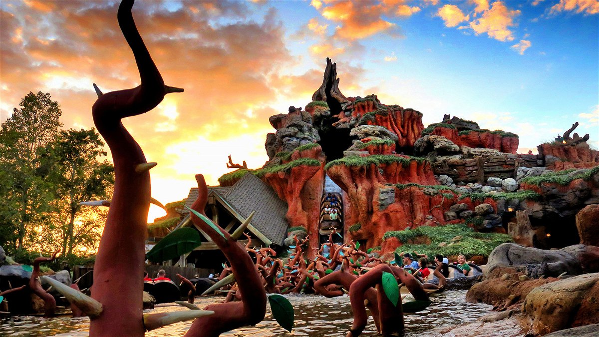 The sun sets on Splash Mountain in the Magic Kingdom at Walt Disney World