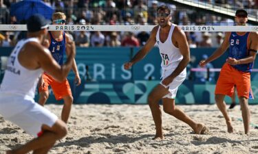 Italy plays the Netherlands in the men's beach volleyball tournament.