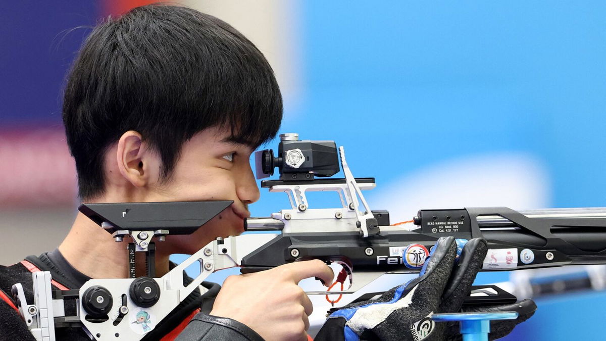 China's Sheng Lihao competes in the shooting 10m Air Rifle Mixed Team final