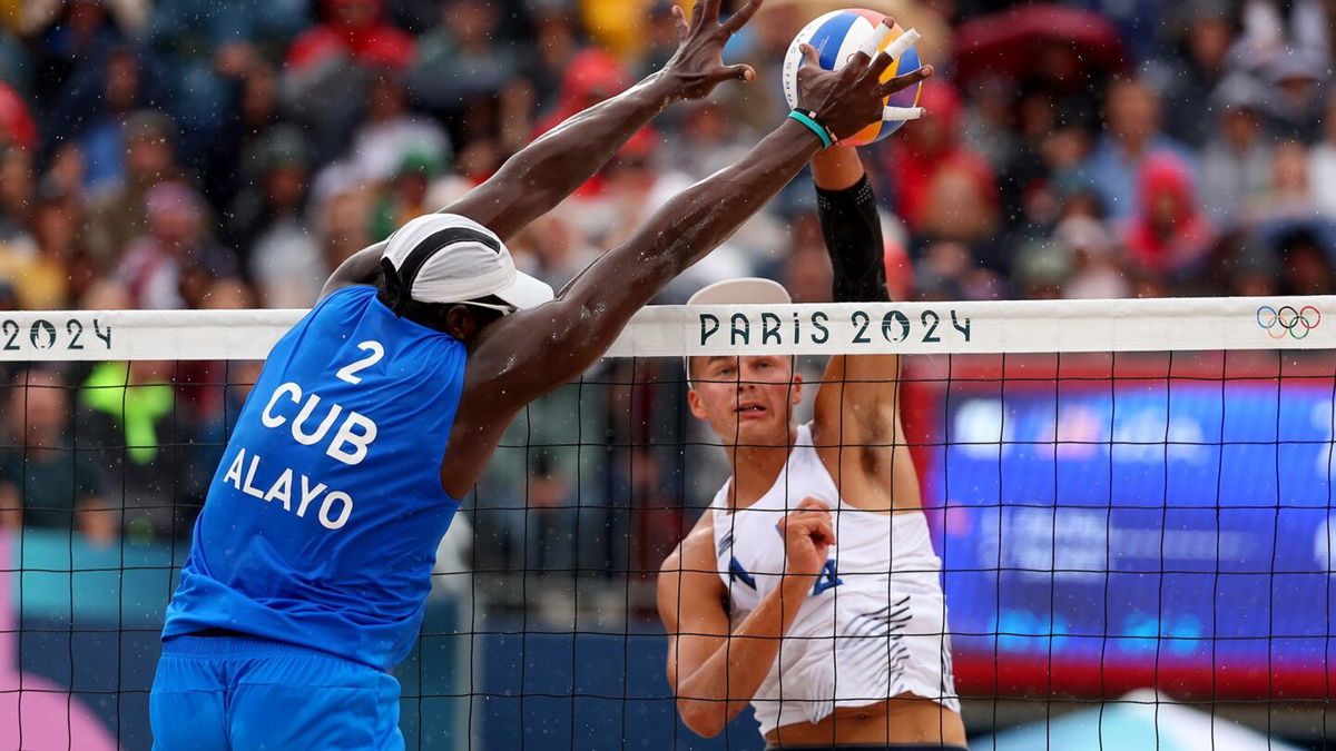 U.S. men's beach volleyball team plays Cuba in pool play