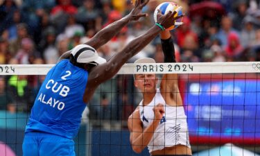 U.S. men's beach volleyball team plays Cuba in pool play