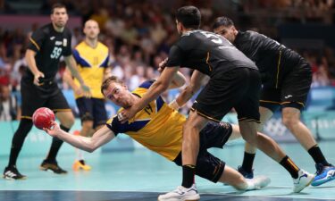 Sweden and Spain compete in men's handball.