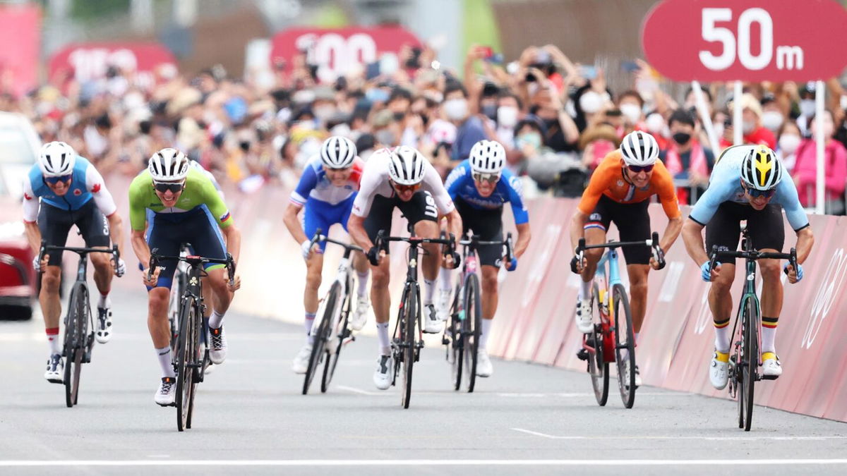 Tadej Pogacar of Team Slovenia bronze medal & Wout van Aert of Team Belgium silver medalist sprints on arrival during the Men's road race at the Fuji International Speedway on day one of the Tokyo 2020 Olympic Games