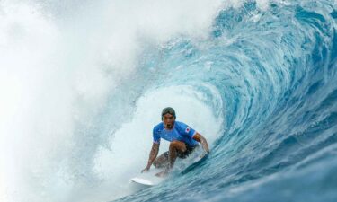 Kanoa Igarashi rides in barrel of wave