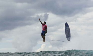 Gabriel Medina puts up No. 1 as he flies through the air