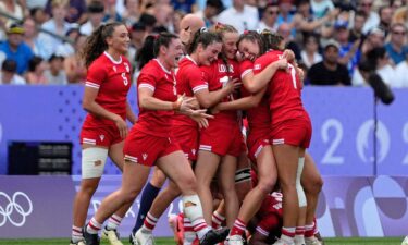 Canada celebrates after their victory over Australia.