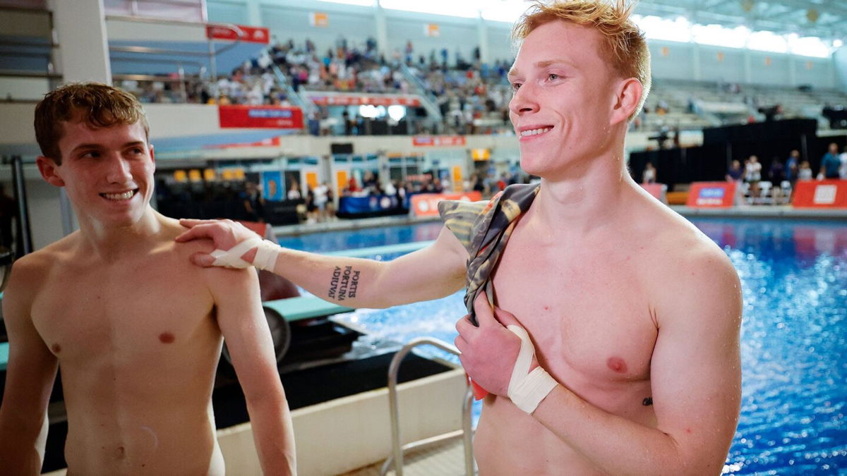 Carson Tyler and Andrew Capobianco after competing in the men's 3m springboard final during the U.S. Olympic Diving Trials  in Knoxville